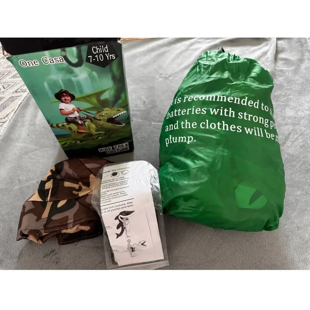 New in Box One Casa Inflatable Ride T-Rex Dinosaur Costume (Child Size 7-10 Yrs)